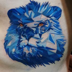Tattoo Lion on the chest motif: animals style: abstract