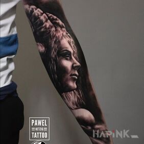 Tattoo She-devil on the forearm motif: demons style: realistic
