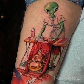 Tattoo Alien ? on the calf motif: colorful style: realistic