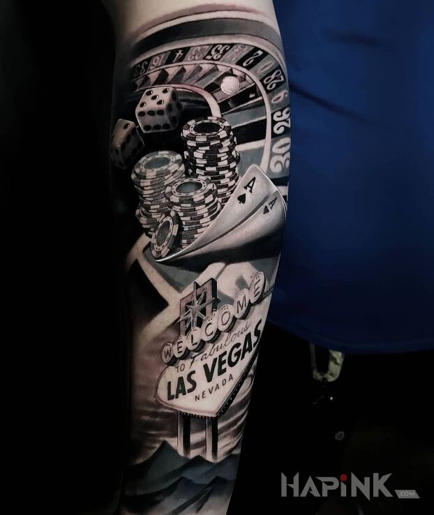 Tattoo Las Vegas in objects motif and realistic style on the forearm