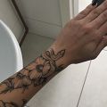 Wycena tatuażu - wycena tatuazu wąż i kwiaty na ręce