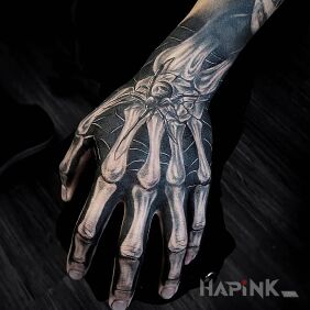 Tattoo Bone hand on the hand motif: anatomical style: realistic