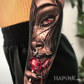 Tattoo Red lollipop on the forearm motif: 3D style: realistic