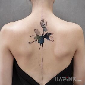Tattoo Watercolor flower on the back motif: colorful style: Watercolor