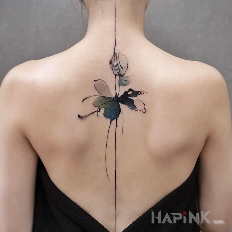 Tattoo Akwarelowy kwiat in colorful motif and Watercolor style on the back