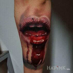 Tattoo Mouth of the vampire on the forearm motif: 3D style: realistic