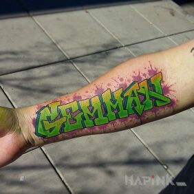 Tattoo Legible graffiti on the forearm motif: lettering style: graffiti