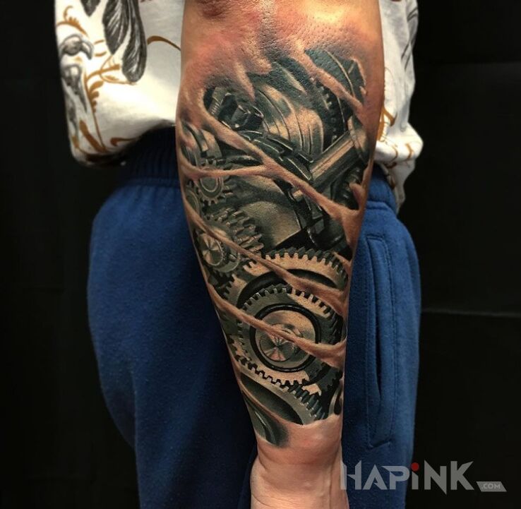 Tattoo Mechanizmy pod skórą in 3D motif and biomechanics style on the forearm