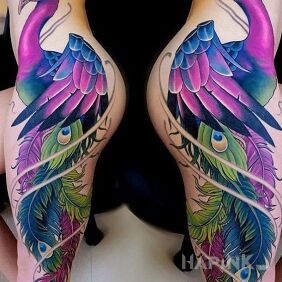 Tattoo Colorful bird on the leg motif: animals