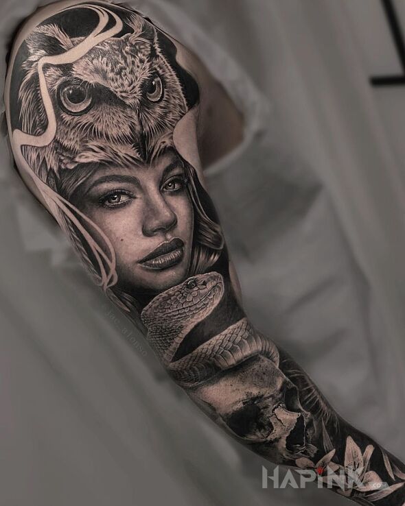 Tattoo Dziewczyna z sową na głowie ? in black and gray motif and realistic style on the forearm