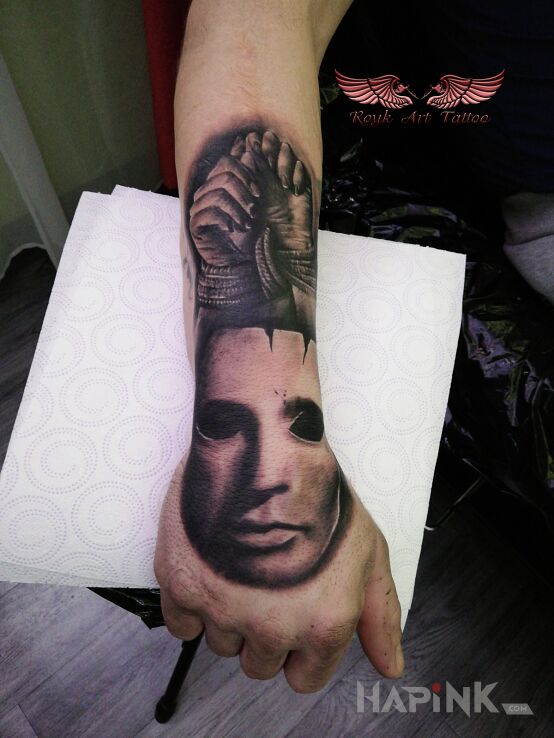 Tattoo :-) coś innego :-) in dark motif and realistic style on the forearm