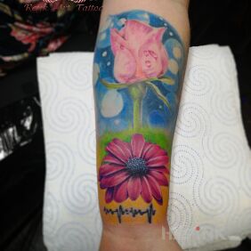 Tattoo Oh those colors on the forearm motif: flowers style: realistic