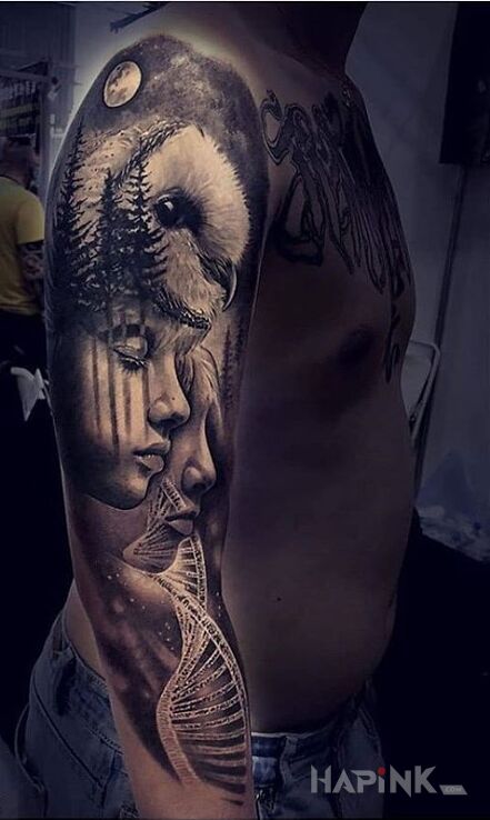 Tattoo Dzikie DNA in animals motif and realistic style on the upper arm