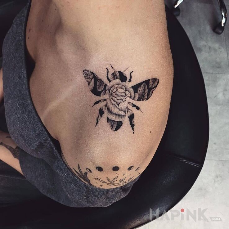 Tattoo Pszczoła z różą in animals motif and graphic / illustrative style on the upper arm