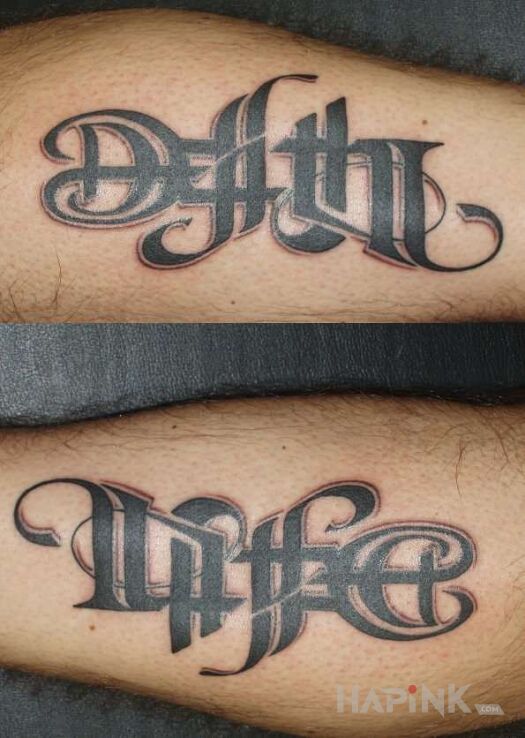 Tattoo Death / life in lettering motif and ambigrams style on the forearm