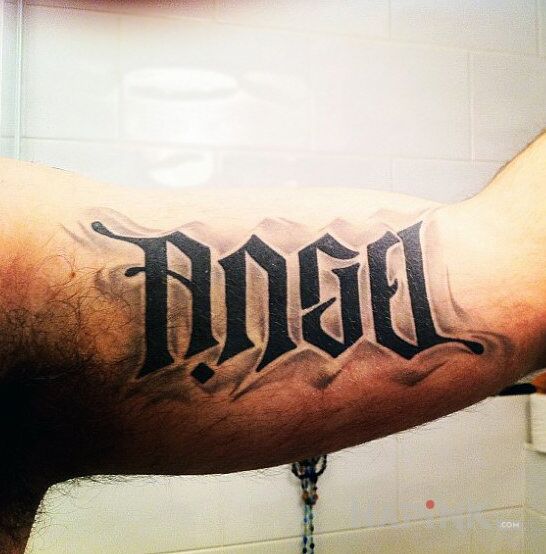 Tattoo Angel / devil in lettering motif and ambigrams style on the upper arm