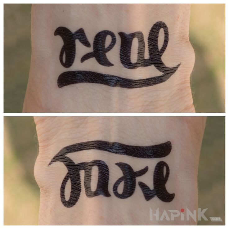 Tattoo Real / fake in lettering motif and ambigrams style on the wrist