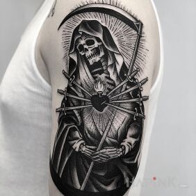 Tattoo Grim reaper in black on the upper arm motif: characters style: graphic / illustrative