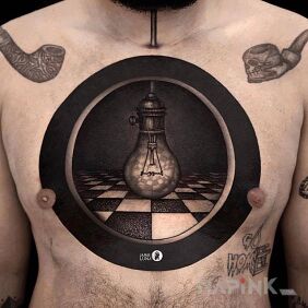 Tattoo Light bulb on the chest motif: black and gray style: optical illusion