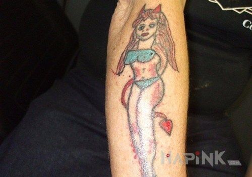 Tattoo Paskudny tatuaż in characters motif on the forearm