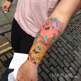 Tattoo Patryk and Spongebob on the forearm motif: colorful style: cartoon / comic book