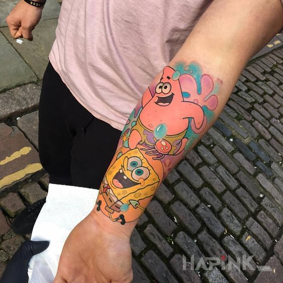 Tattoo Patryk i Spongebob in colorful motif and cartoon / comic book style on the forearm
