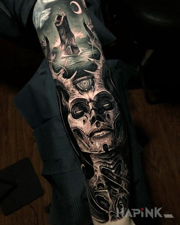 Tattoo Diablica in demons motif and realistic style on the upper arm