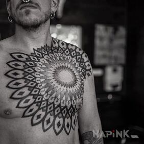 Tattoo Large mandala on the chest motif: mandalas style: geometric