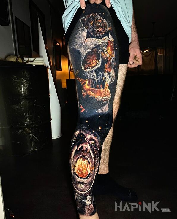 Tattoo Ogień jak widać ??? in faces motif and realistic style on the leg
