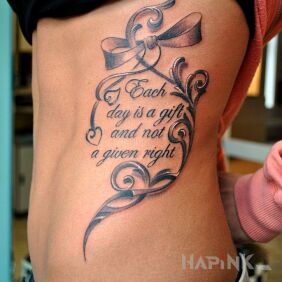 Tattoo Certain wisdom on the ribs motif: ornaments style: calligraphy