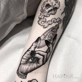 Tattoo Poison vial on the upper arm motif: dark style: graphic / illustrative