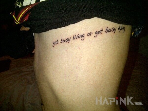 Tattoo Zdecyduj sam in lettering motif on the ribs