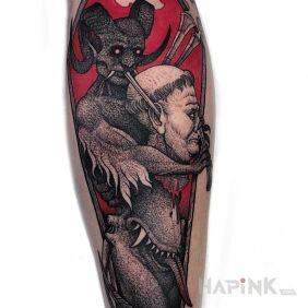 Tattoo Juice from the head on the calf motif: dark style: graphic / illustrative