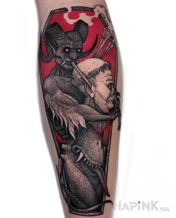 Tattoo Soczek z głowy in dark motif and graphic / illustrative style on the calf