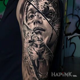 Tattoo Calm woman angry cat on the upper arm motif: faces style: realistic