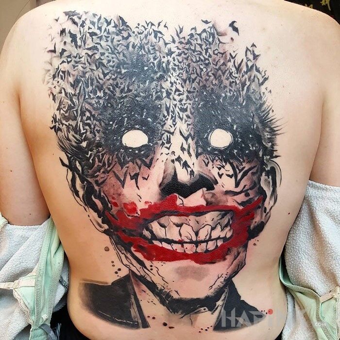 Tattoo Joker in characters motif on the back