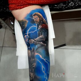 Tattoo Thor on the upper arm motif: colorful style: realistic