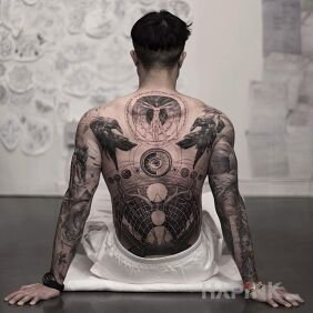 Tattoo Awesome back on the upper arm motif: characters style: graphic / illustrative