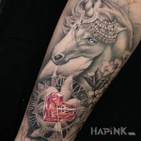 Tattoo Unicorn with a crown on the forearm motif: 3D style: realistic
