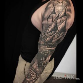 Tattoo Sleeve with a ship on the forearm motif: sleeves style: realistic