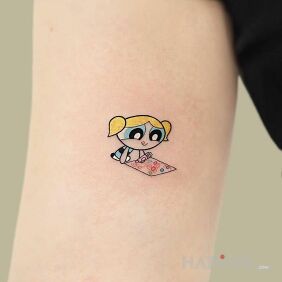 Tattoo Powerpuff Girl on the upper arm motif: characters style: cartoon / comic book
