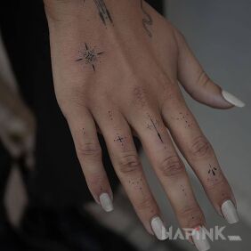 Tattoo Tiny patterns on the hand motif: ornaments style: minimalistic