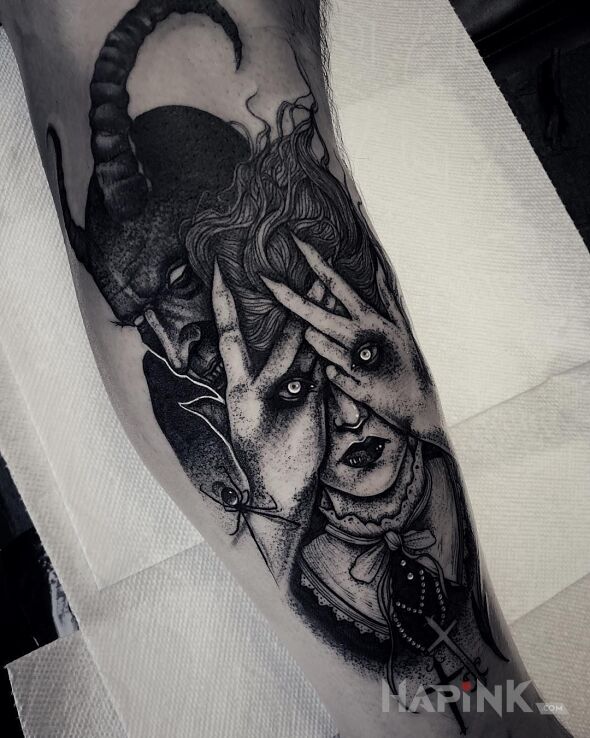 Tattoo Za kobietą stoi diabeł in black and gray motif and graphic / illustrative style on the calf