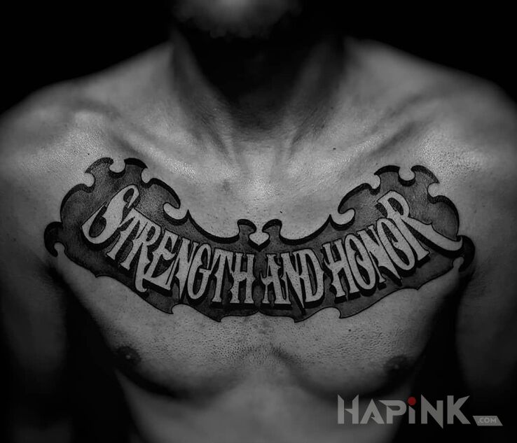 Tattoo Siła i honor in lettering motif and calligraphy style on the chest