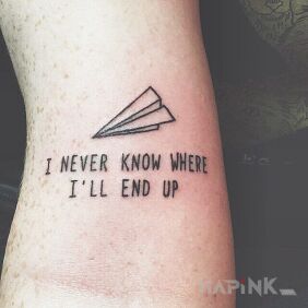 Tattoo Paper airplane on the forearm motif: lettering style: minimalistic