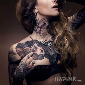 Tattoo A gray-haired woman with cool tattoos on the chest motif: butterflies