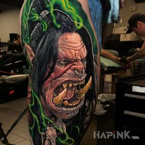 Tattoo World of Warcraft on the leg motif: colorful style: realistic
