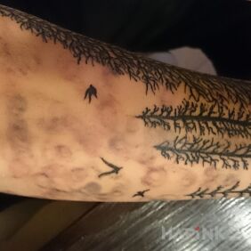 Tattoo Dark forest on the forearm motif: sleeves