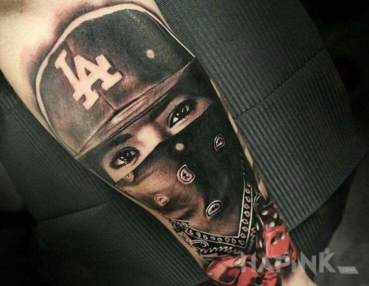Tattoo Laska w bandanie in characters motif and realistic style on the forearm