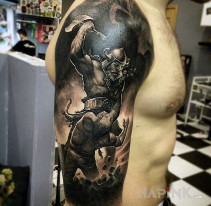 Tattoo Jeb w leb toporem in characters motif and realistic style on the upper arm